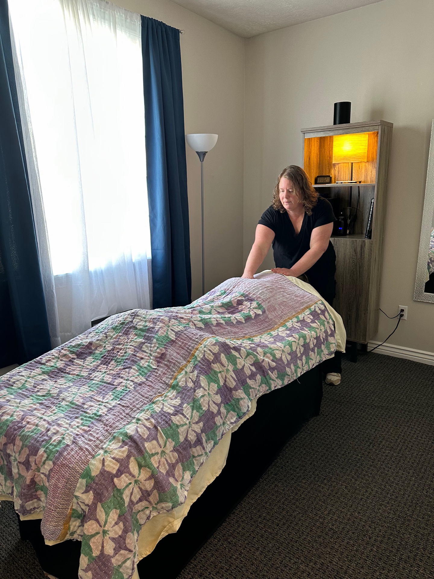 Liz Moffat working with a massage client in Murray Utah